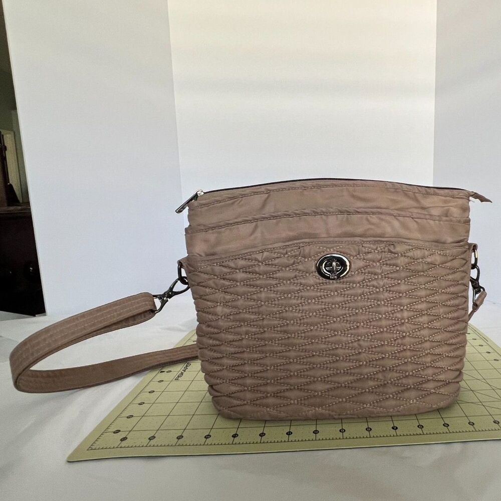 Lug Adagio in Tan Cross body with built in RFID Wallet GUC